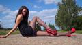 Screenshot A Young Girl In A Short Dress And Heels Shows Legs