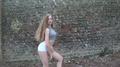 Screenshot Masha In Short White Shorts At The Wall
