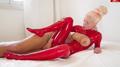 Screenshot (porno 18+): Laura German The Red Latex Doll: