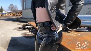 Screenshot Amateur Girl in Shiny Vinyl Latex Leggings Receives a Huge Load of Cum