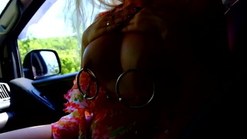 Screenshot Naked Tits with Piercings in the Car