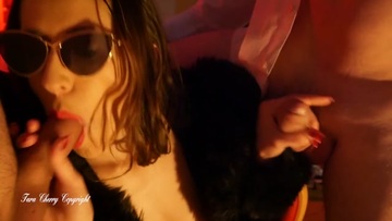 Screenshot MFM threesome. Wife in sunglasses serves two guys 
