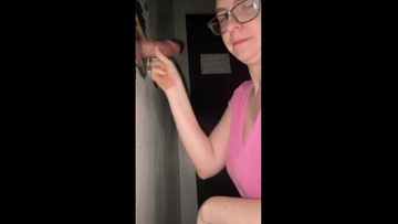 Screenshot Hotwife sucks stranger in gloryhole